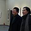 张正忠先生与扬州八怪纪念馆馆长刘方明在观看画展